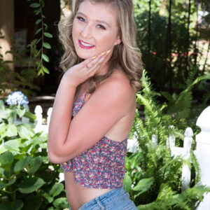 charming blonde teen april aniston exposes her tan lines in the backyard